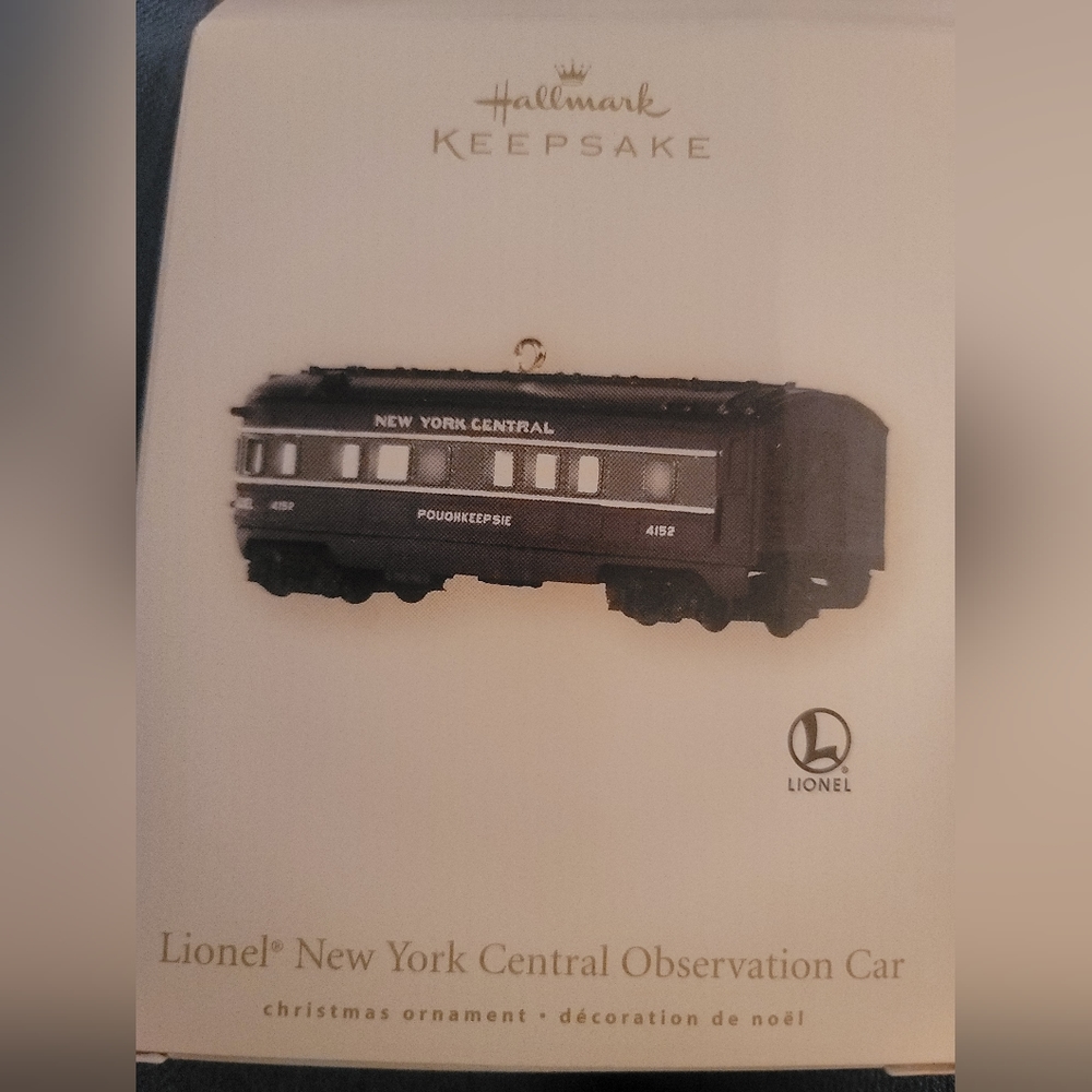 Hallmark Lionel New York Central engine, passenger car, and observation cars.